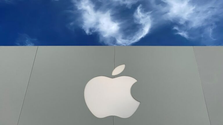 the apple logo is shown atop an apple store at a shopping mall in la jolla california