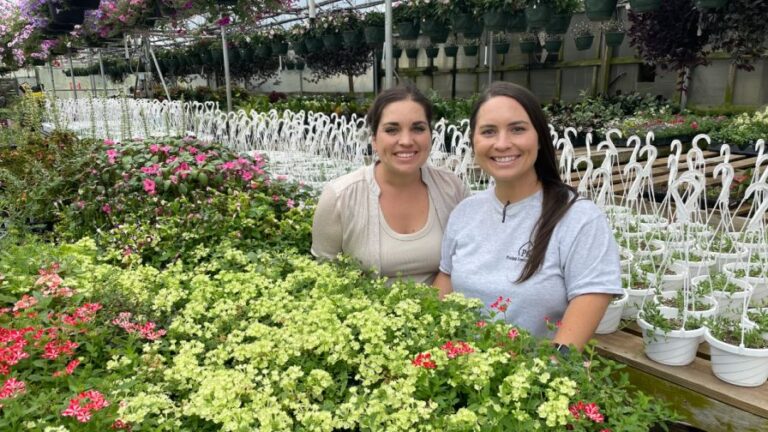 Puckett Greenhouses co owners Amy Lane left and Ashley Payne in one of the companys greenhouses