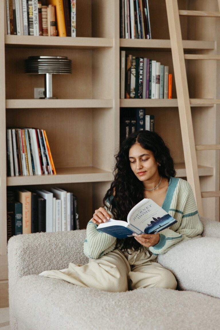 woman reading on couch 1 865x1296