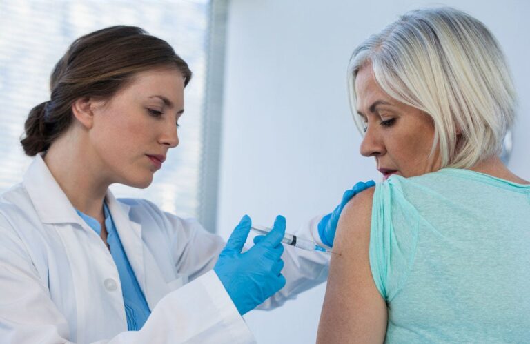 woman getting vaccine